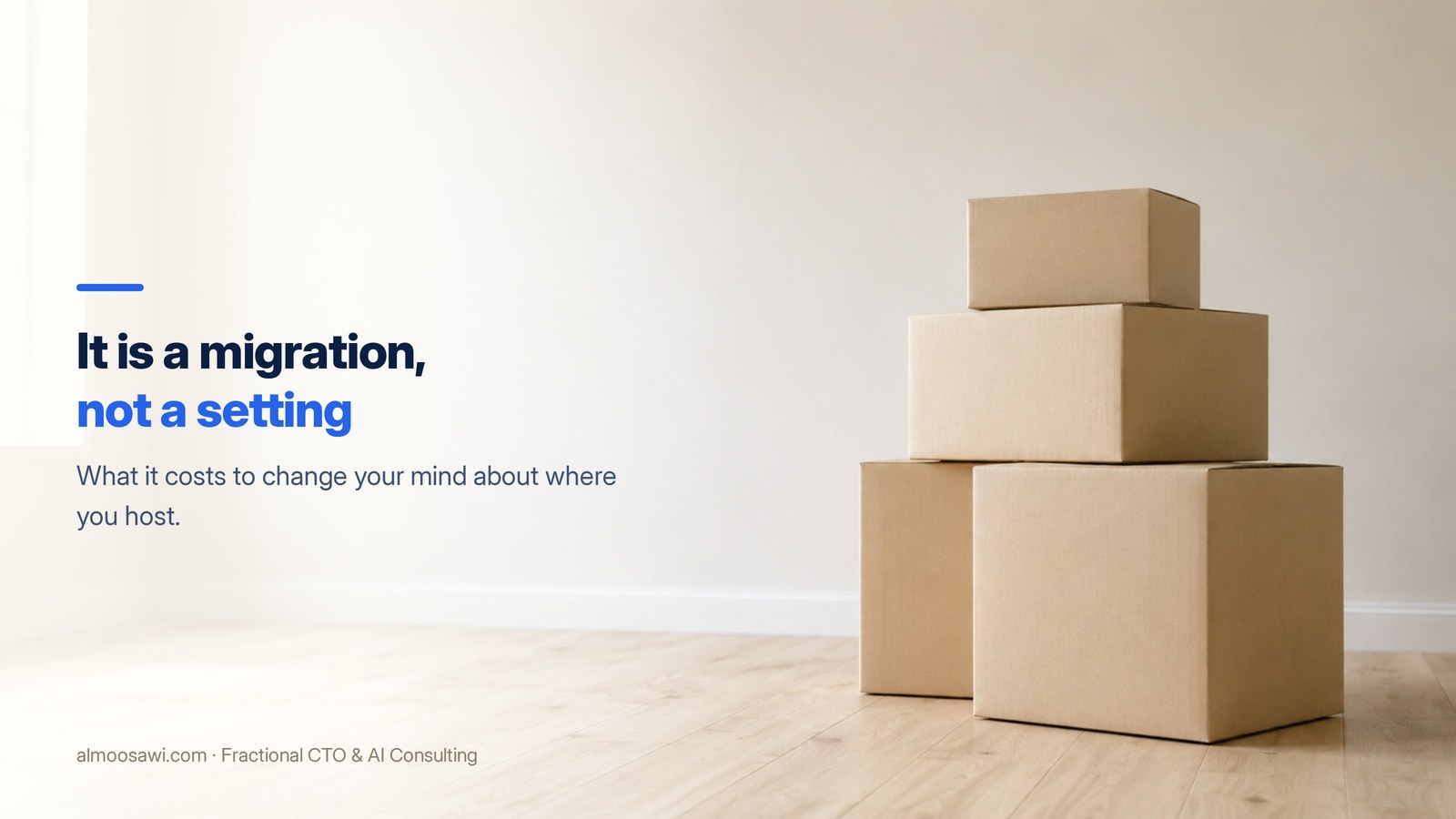 Plain cardboard moving boxes stacked in an empty, brightly lit room with a bare wall and wooden floor